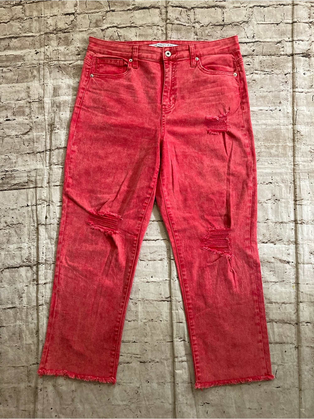 Celebrity pink , pinkish red distressed jeans size 13/31